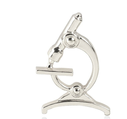Europe and the United States cross-border new hot sale medical equipment brooch creative laryngoscope alloy micro chapter clothing bag accessories